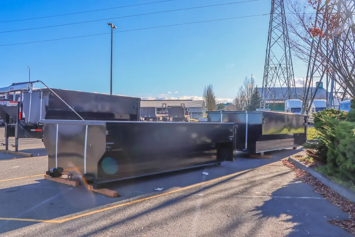 Roll-off dumpster ready for waste disposal at job site for Concrete Dumpster Rental in Bryans Road